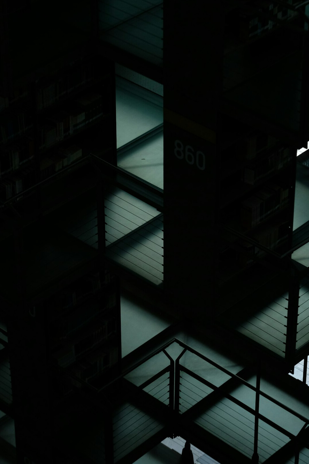 woman reading book at night