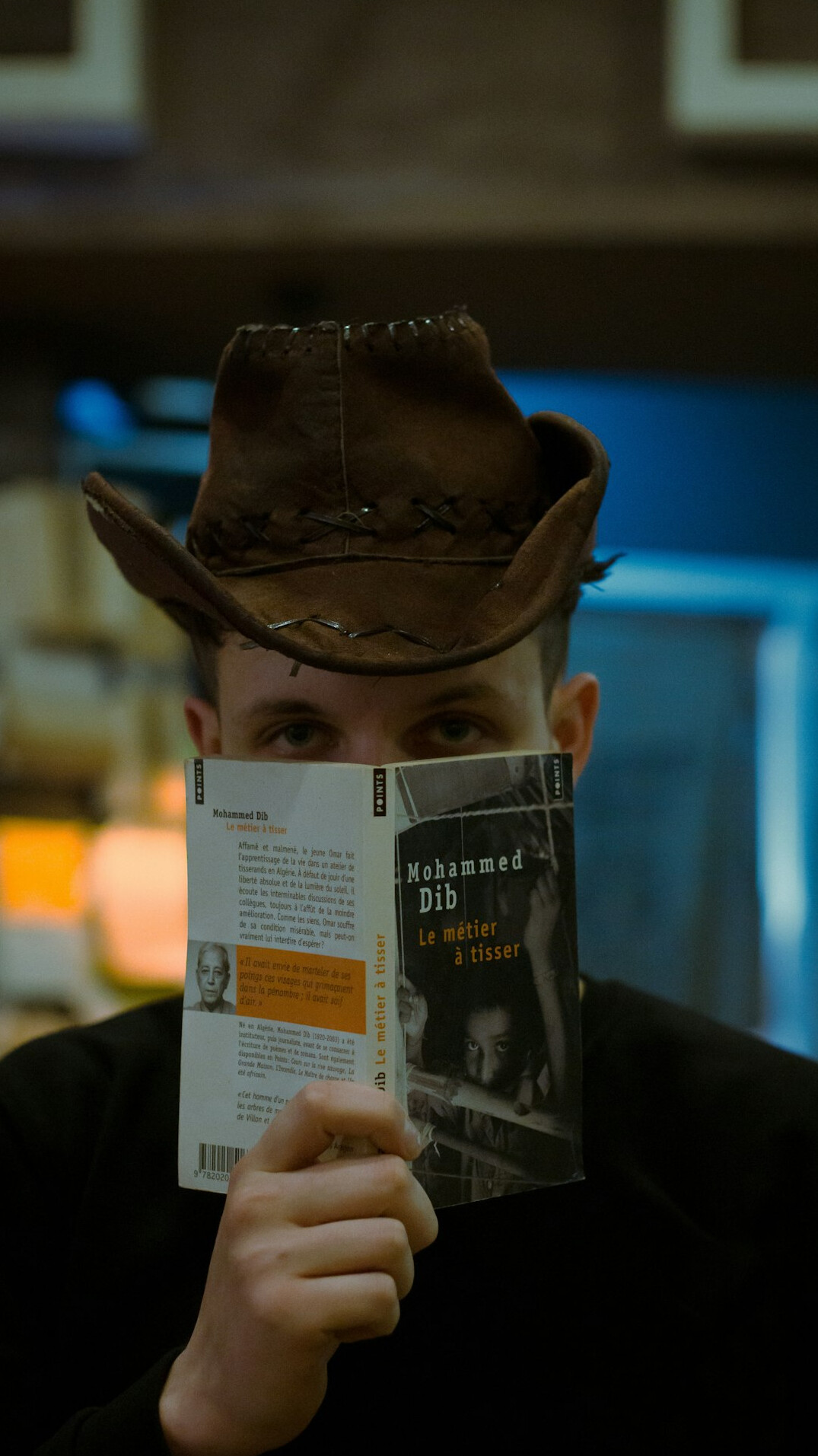 detective reading mystery book